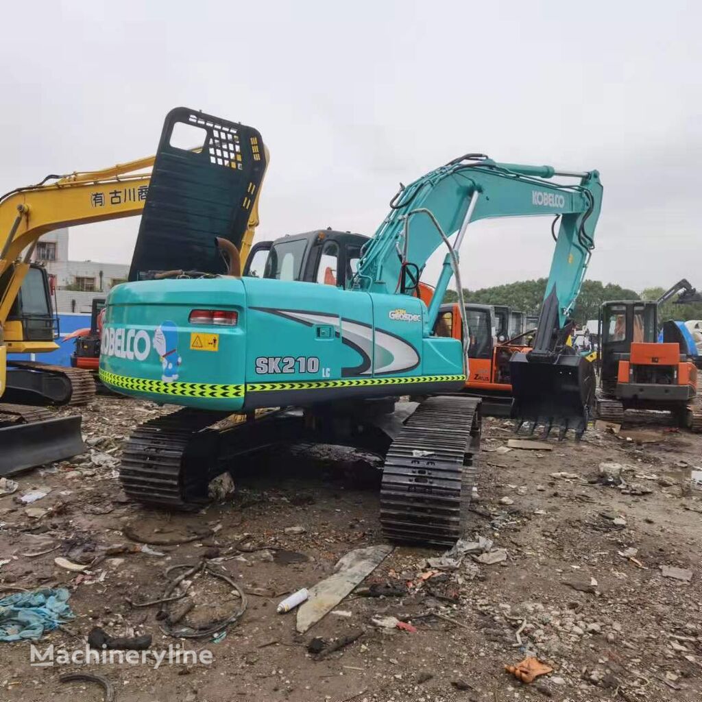 حفارة مجنزرة Kobelco SK210